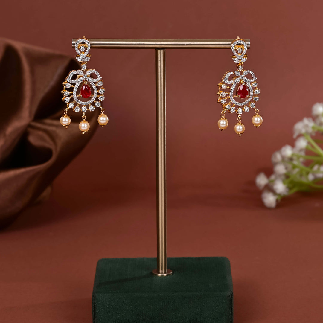 Hriday collection of 92.5 silver earrings with CZ stones, intricate  design for bridal and festive wear by Sri fine jewellery, Hyderabad.
(https://www.srifinejewellery.com)