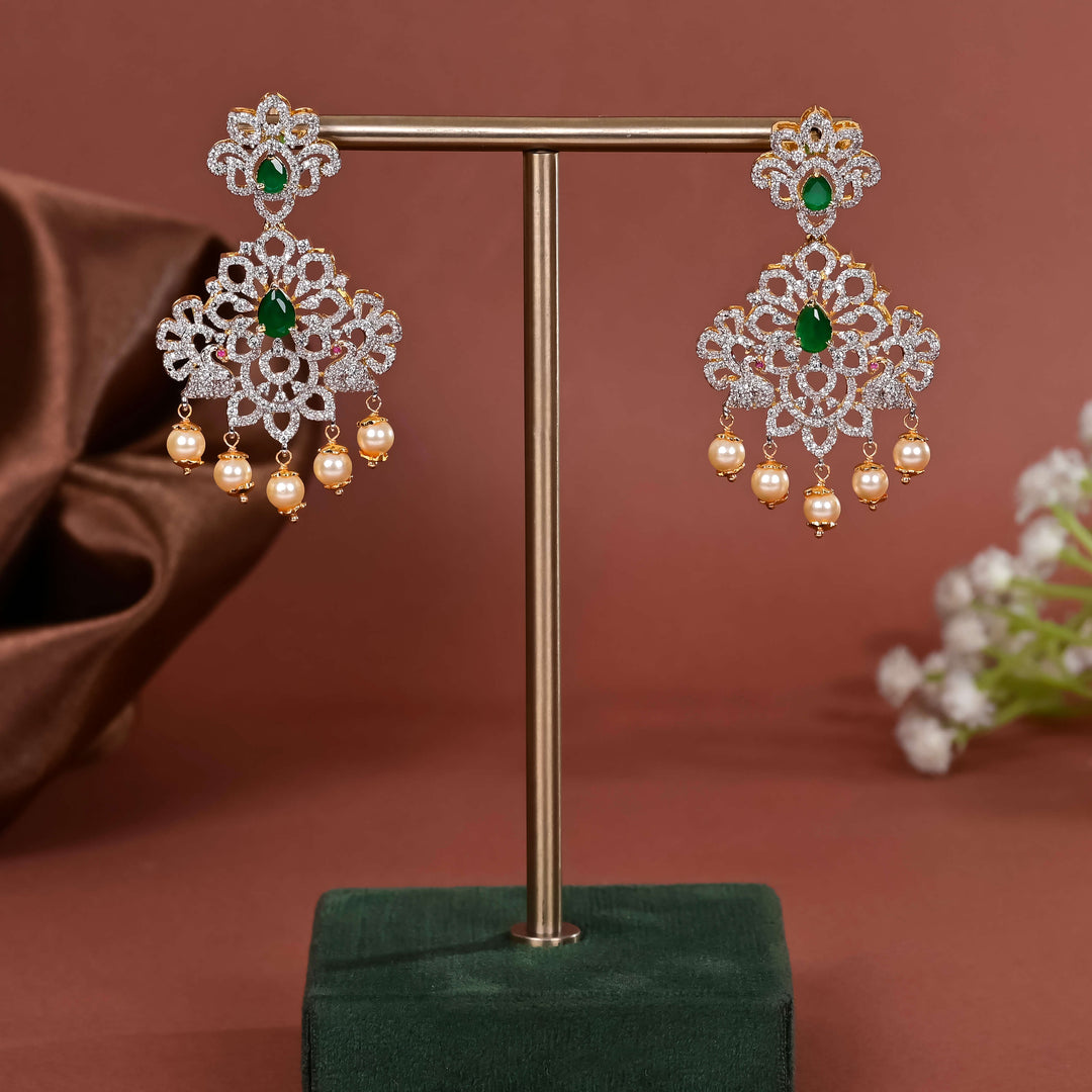 Hriday collection of 92.5 silver earrings with CZ stones, intricate  design for bridal and festive wear by Sri fine jewellery, Hyderabad.
(https://www.srifinejewellery.com)