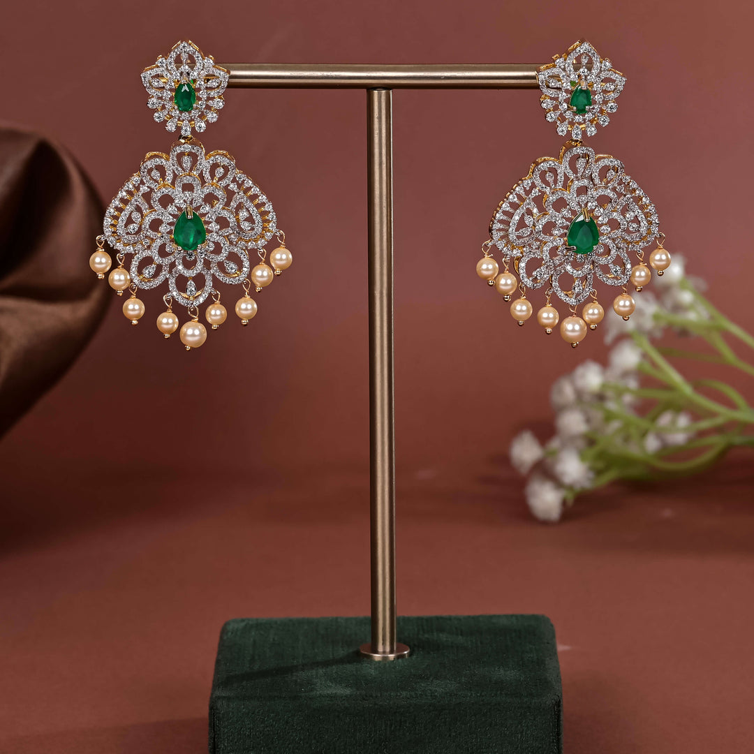Hriday collection of 92.5 silver earrings with CZ stones, intricate  design for bridal and festive wear by Sri fine jewellery, Hyderabad.
(https://www.srifinejewellery.com)