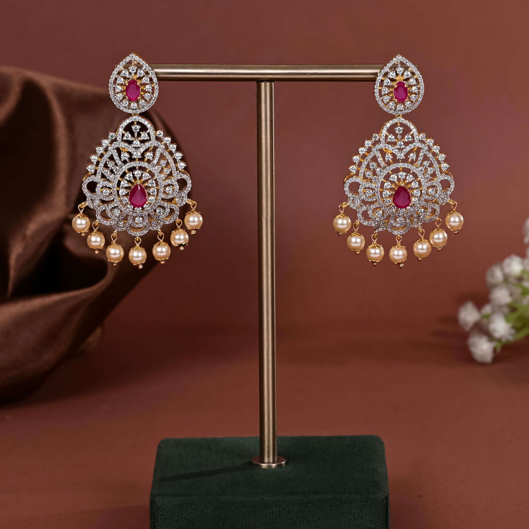 Hriday collection of 92.5 silver earrings with CZ stones, intricate  design for bridal and festive wear by Sri fine jewellery, Hyderabad.
(https://www.srifinejewellery.com)