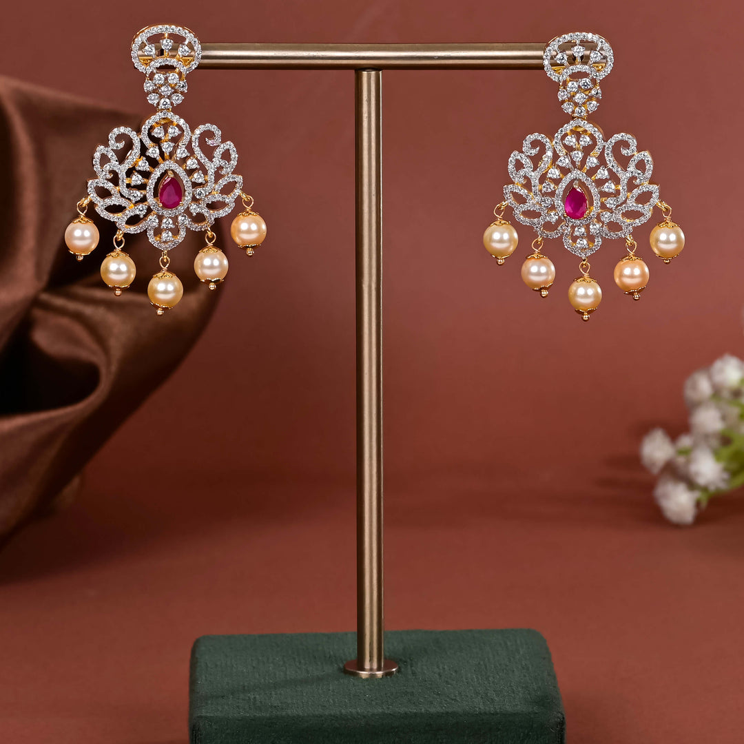 Hriday collection of 92.5 silver earrings with CZ stones, intricate  design for bridal and festive wear by Sri fine jewellery, Hyderabad.
(https://www.srifinejewellery.com)