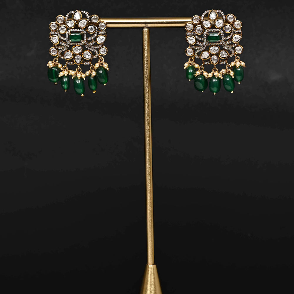 Premium 92.5 silver moissanite earrings with pearl drops, antique finish, and intricate handcrafted detailing by Sri Fine Jewellery, Hyderabad
(https://www.srifinejewellery.com)
