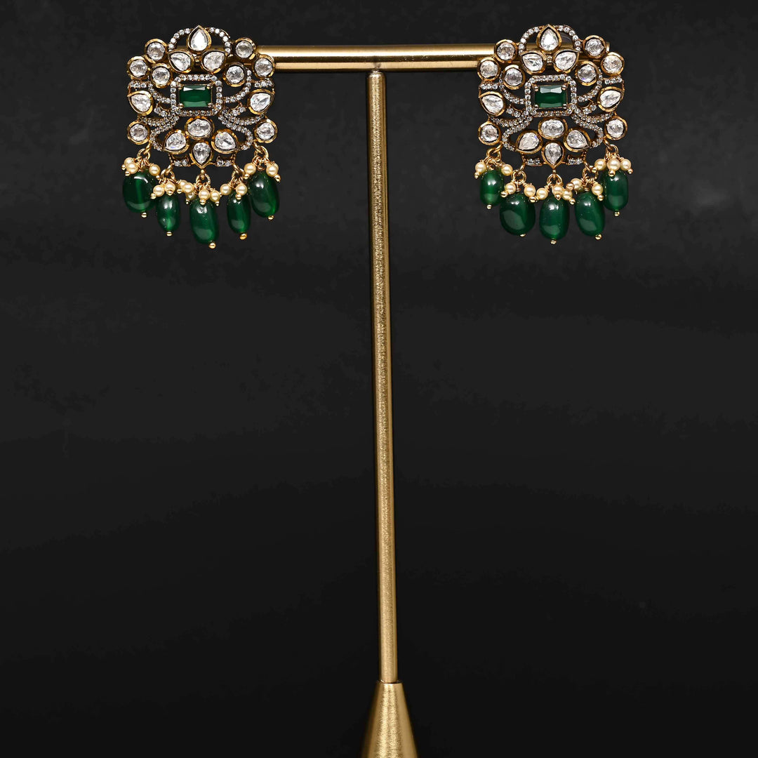 Premium 92.5 silver moissanite earrings with pearl drops, antique finish, and intricate handcrafted detailing by Sri Fine Jewellery, Hyderabad
(https://www.srifinejewellery.com)