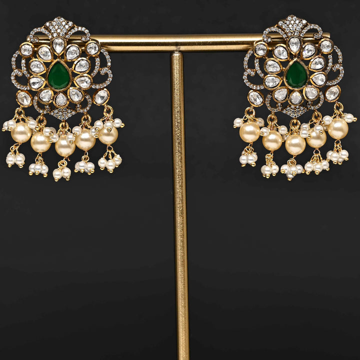 Premium 92.5 silver moissanite earrings with pearl drops, antique finish, and intricate handcrafted detailing by Sri Fine Jewellery, Hyderabad
(https://www.srifinejewellery.com)