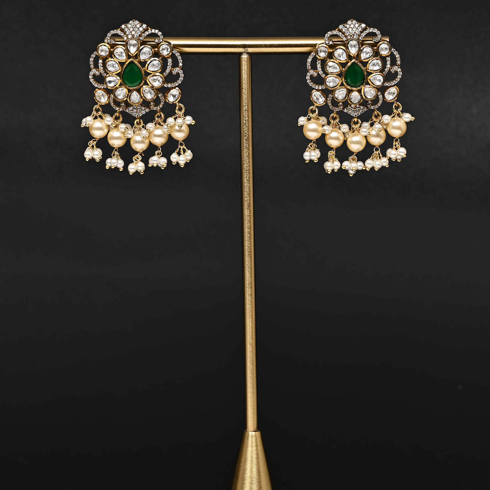 Premium 92.5 silver moissanite earrings with pearl drops, antique finish, and intricate handcrafted detailing by Sri Fine Jewellery, Hyderabad
(https://www.srifinejewellery.com)