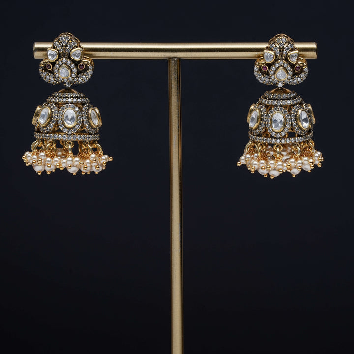 Premium 92.5 silver moissanite jhumka earrings with pearl drops, antique finish, and intricate handcrafted detailing by Sri Fine Jewellery, Hyderabad
(https://www.srifinejewellery.com)
