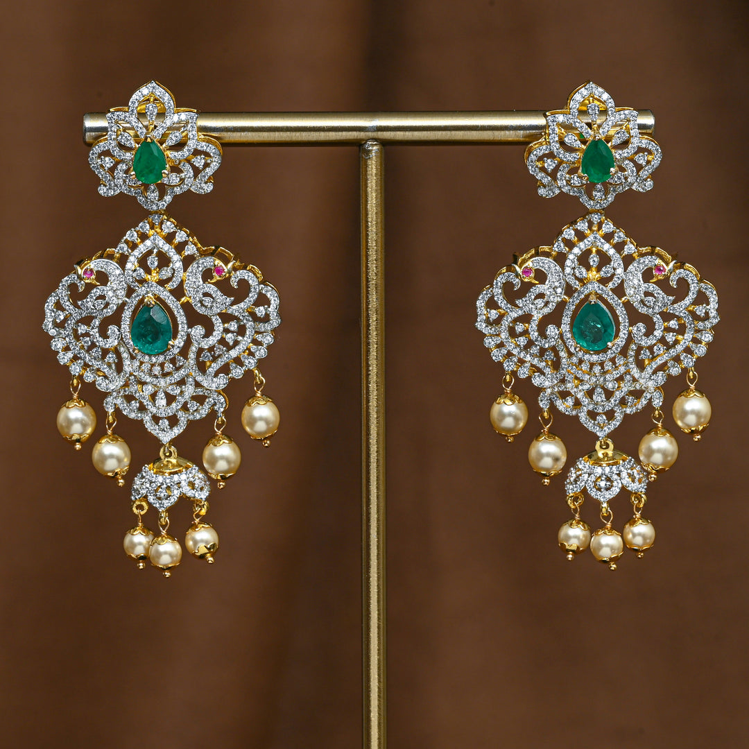 Full view of premium 92.5 silver cz emerald earrings with intricate detailing and pearl drops by Sri Fine Jewellery, Hyderabad (https://srifinejewellery.com)