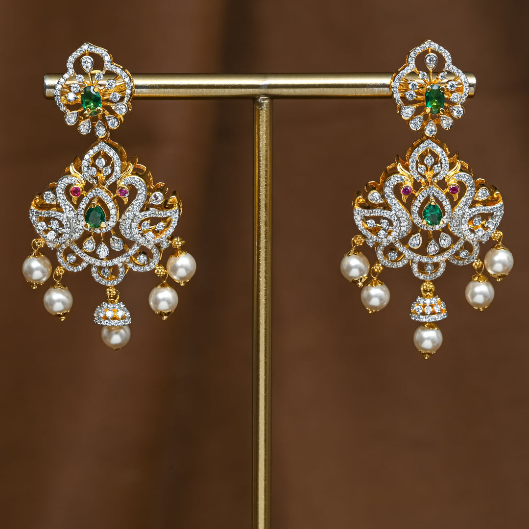Full view of premium 92.5 silver cz emerald earrings with peacock design and pearl drops by Sri Fine Jewellery, Hyderabad (https://srifinejewellery.com)