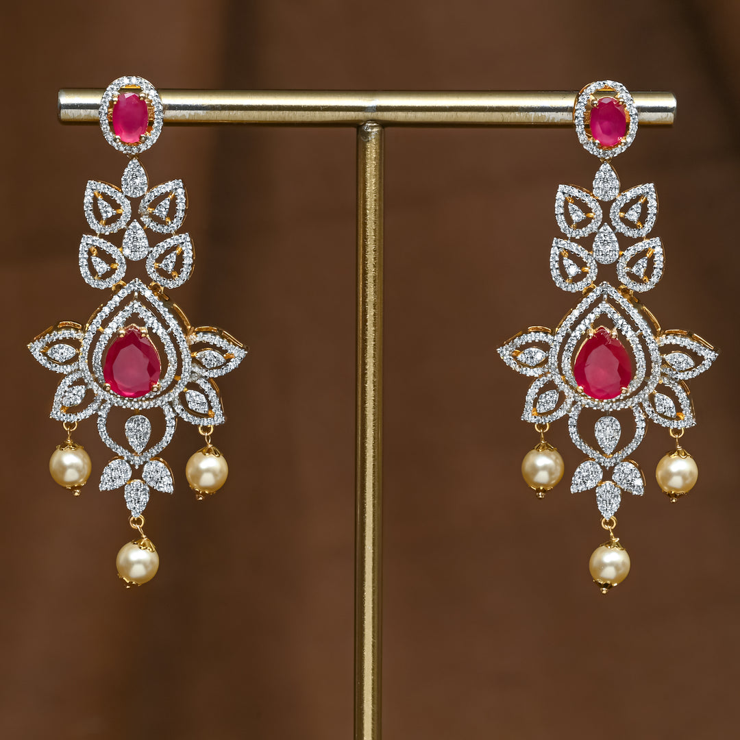 Full view of premium 92.5 silver cz ruby earrings with intricate detailing and pearl drops by Sri Fine Jewellery, Hyderabad (https://srifinejewellery.com)