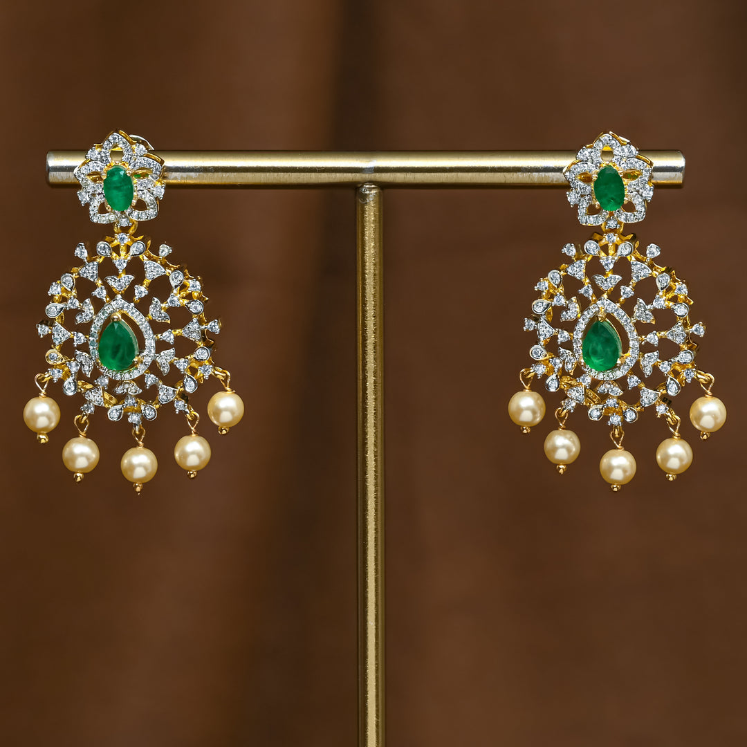 Full view of premium 92.5 silver cz emerald earrings with intricate detailing and pearl drops by Sri Fine Jewellery, Hyderabad (https://srifinejewellery.com)