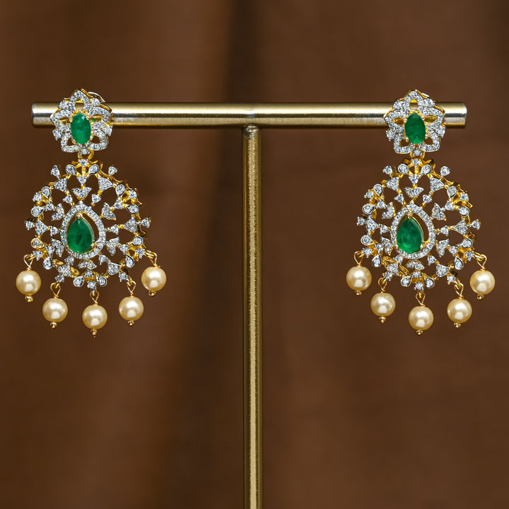 Full view of premium 92.5 silver cz emerald earrings with intricate detailing and pearl drops by Sri Fine Jewellery, Hyderabad (https://srifinejewellery.com)