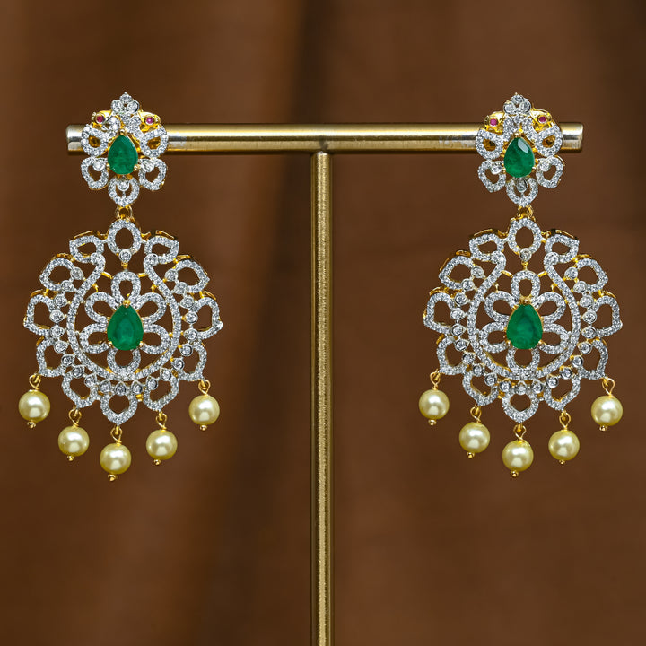 Full view of premium 92.5 silver cz emerald earrings with intricate detailing and pearl drops by Sri Fine Jewellery, Hyderabad (https://srifinejewellery.com)

