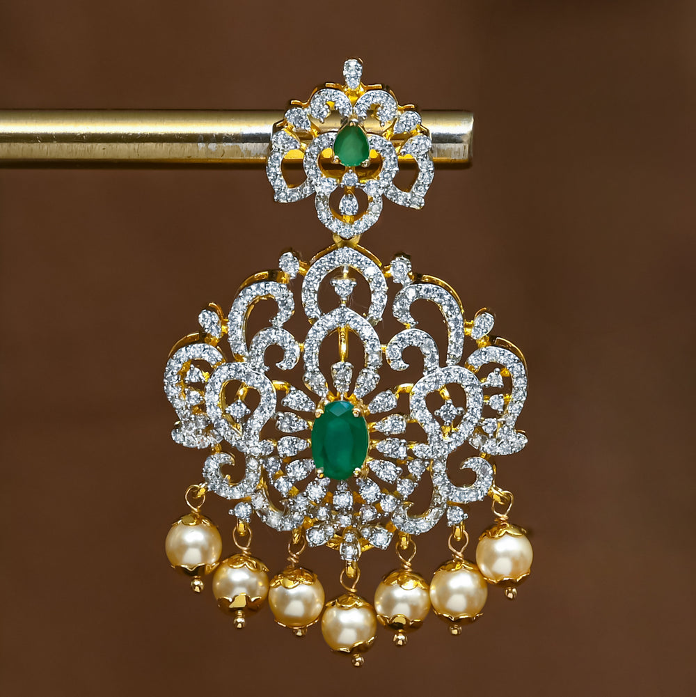 Close-up view of premium 92.5 silver cz emerald earrings with intricate detailing and pearl drops by Sri Fine Jewellery, Hyderabad (https://srifinejewellery.com)