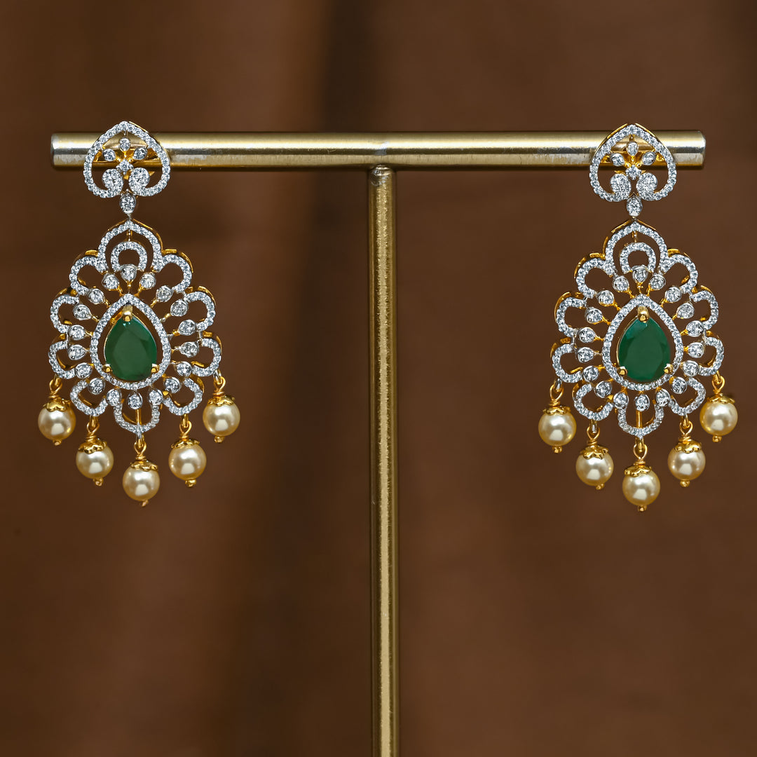 Full view of premium 92.5 silver cz emerald earrings with intricate detailing and pearl drops by Sri Fine Jewellery, Hyderabad (https://srifinejewellery.com)