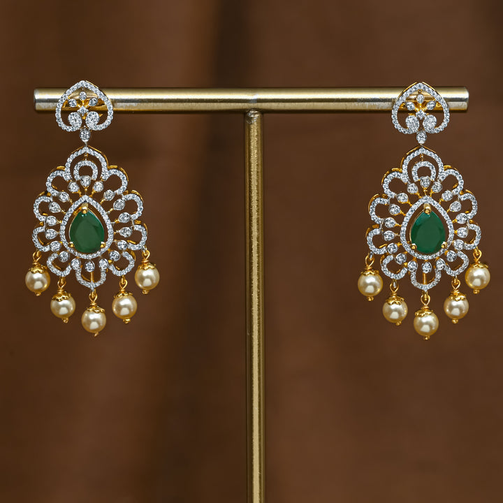 Full view of premium 92.5 silver cz emerald earrings with intricate detailing and pearl drops by Sri Fine Jewellery, Hyderabad (https://srifinejewellery.com)