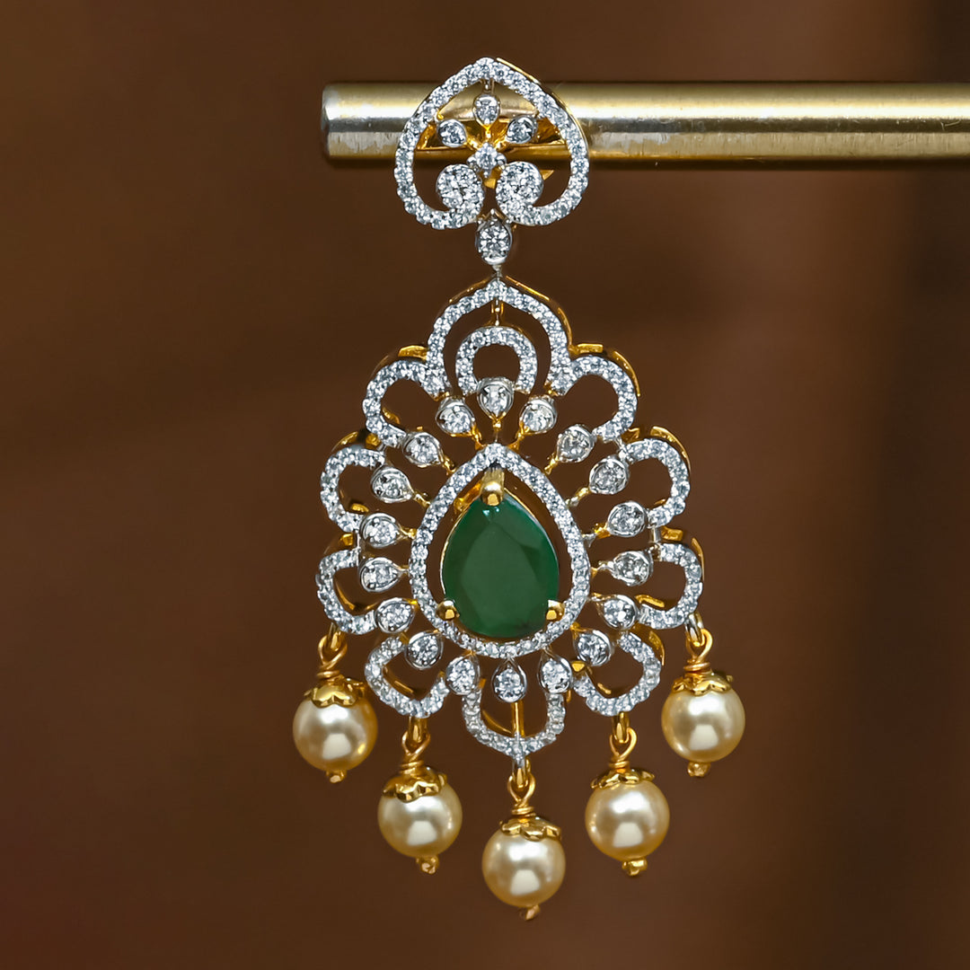 Close-up view of premium 92.5 silver cz emerald earrings with intricate detailing and pearl drops by Sri Fine Jewellery, Hyderabad (https://srifinejewellery.com)
