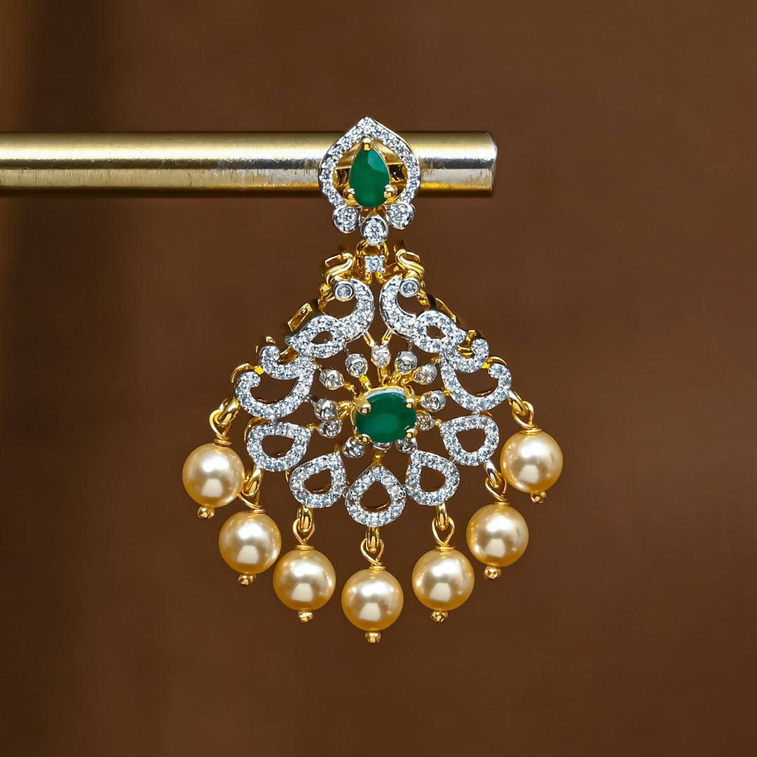 Close-up view of premium 92.5 silver cz emerald earrings with intricate detailing and pearl drops by Sri Fine Jewellery, Hyderabad (https://srifinejewellery.com)