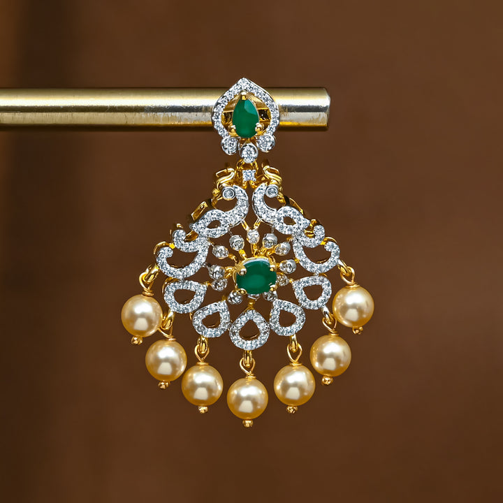 Close-up view of premium 92.5 silver cz emerald earrings with intricate detailing and pearl drops by Sri Fine Jewellery, Hyderabad (https://srifinejewellery.com)