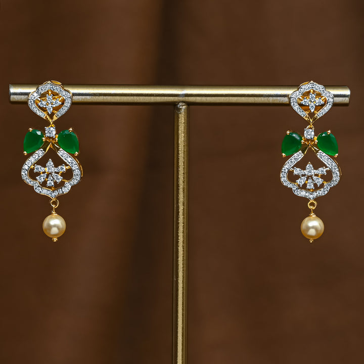 Full view of premium 92.5 silver cz emerald earrings with intricate detailing and pearl drop by Sri Fine Jewellery, Hyderabad (https://srifinejewellery.com)
