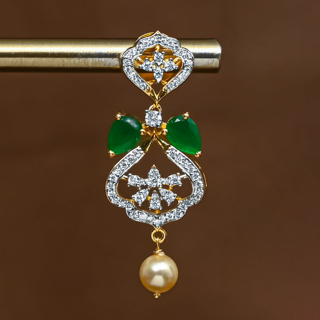 Close-up view of premium 92.5 silver cz emerald earrings with intricate detailing and pearl drop by Sri Fine Jewellery, Hyderabad (https://srifinejewellery.com)