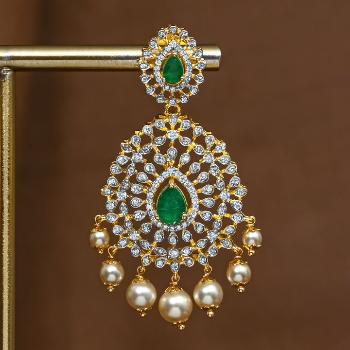 Close-up view of premium 92.5 silver cz emerald earrings with intricate detailing and pearl drops by Sri Fine Jewellery, Hyderabad (https://srifinejewellery.com)