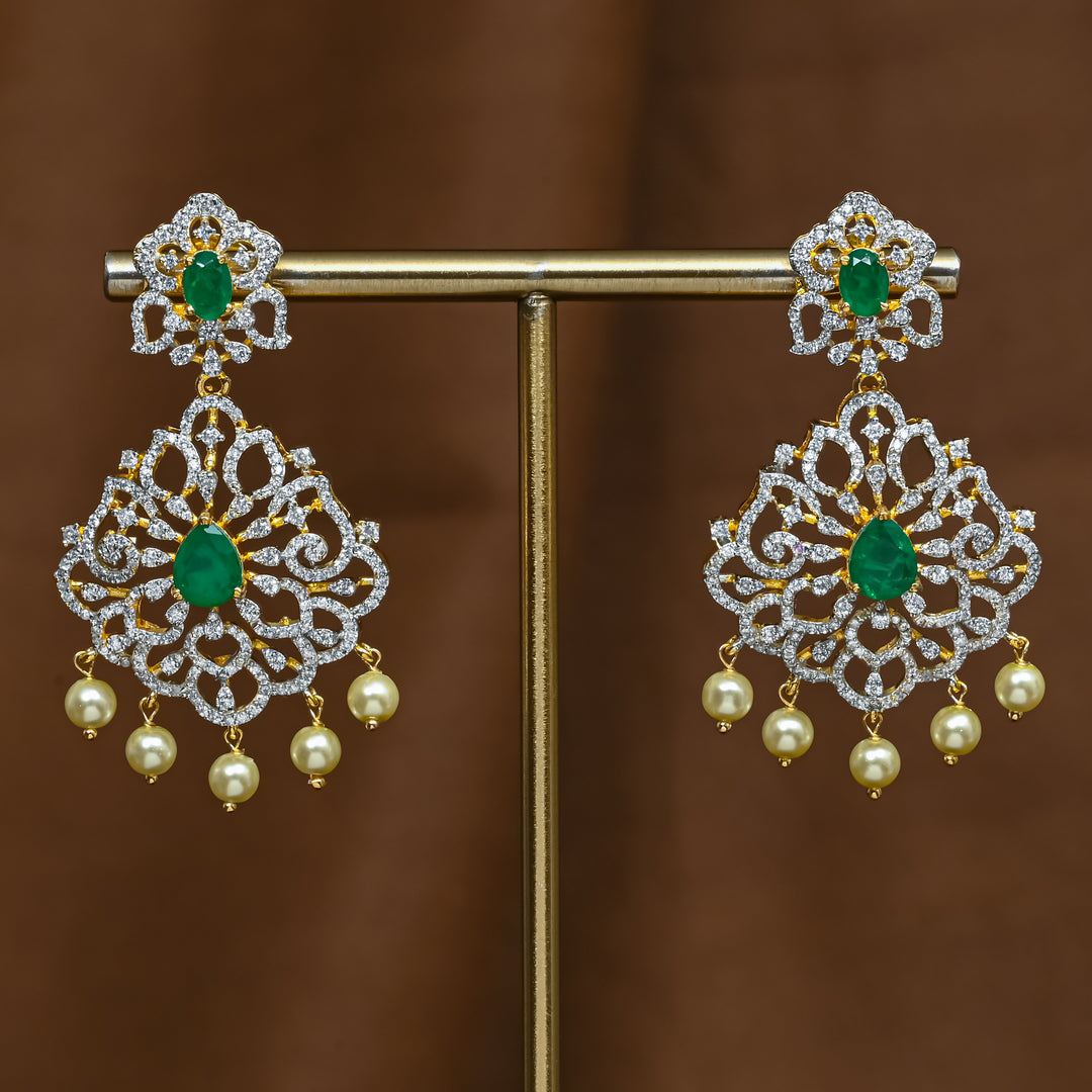 Full view of premium 92.5 silver cz emerald earrings with intricate detailing and pearl drops by Sri Fine Jewellery, Hyderabad (https://srifinejewellery.com)