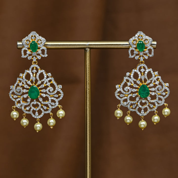 Full view of premium 92.5 silver cz emerald earrings with intricate detailing and pearl drops by Sri Fine Jewellery, Hyderabad (https://srifinejewellery.com)