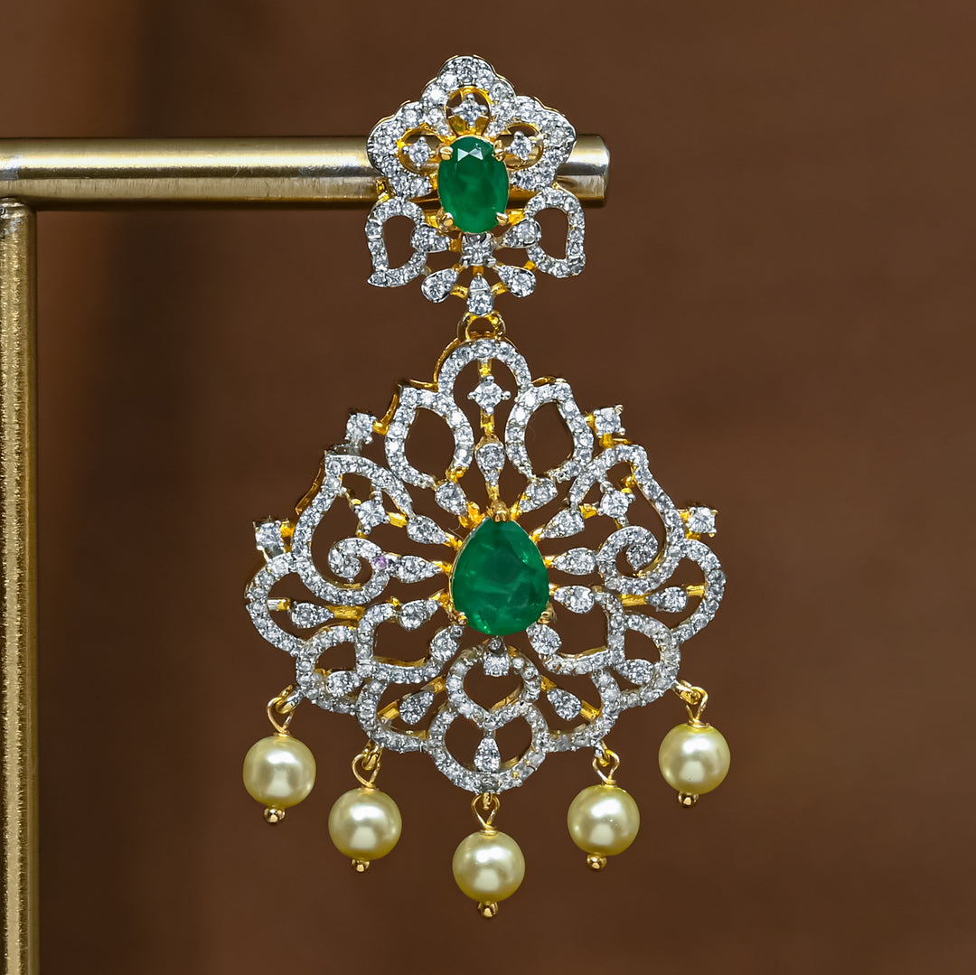 Close-up view of premium 92.5 silver cz emerald earrings with intricate detailing and pearl drops by Sri Fine Jewellery, Hyderabad (https://srifinejewellery.com)