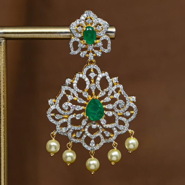 Close-up view of premium 92.5 silver cz emerald earrings with intricate detailing and pearl drops by Sri Fine Jewellery, Hyderabad (https://srifinejewellery.com)