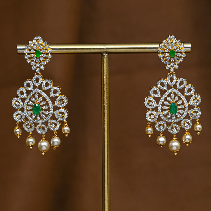 Full view of premium 92.5 silver cz emerald earrings with intricate detailing and pearl drops by Sri Fine Jewellery, Hyderabad (https://srifinejewellery.com)