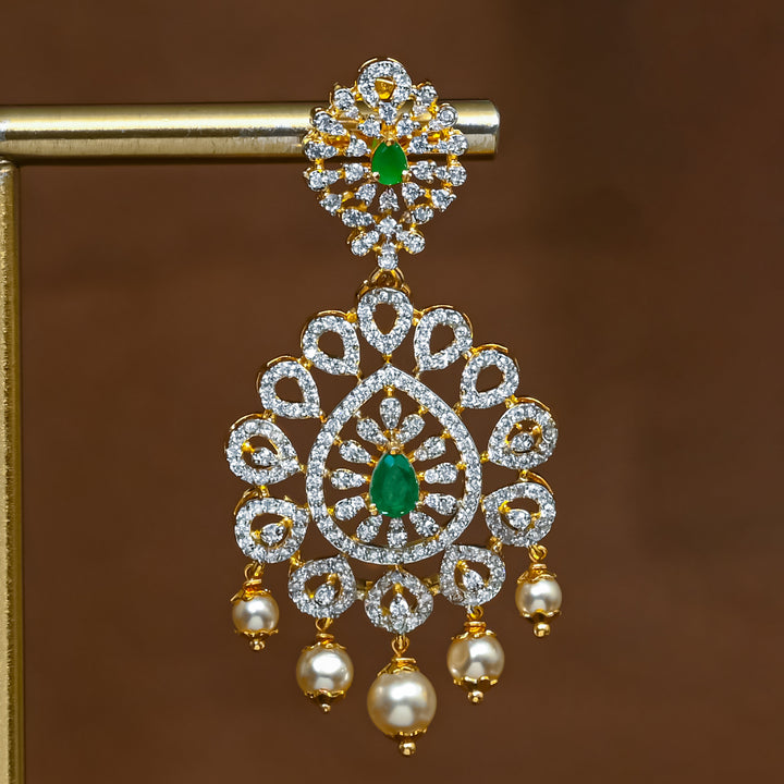 Close-up view of premium 92.5 silver cz emerald earrings with intricate detailing and pearl drops by Sri Fine Jewellery, Hyderabad (https://srifinejewellery.com)