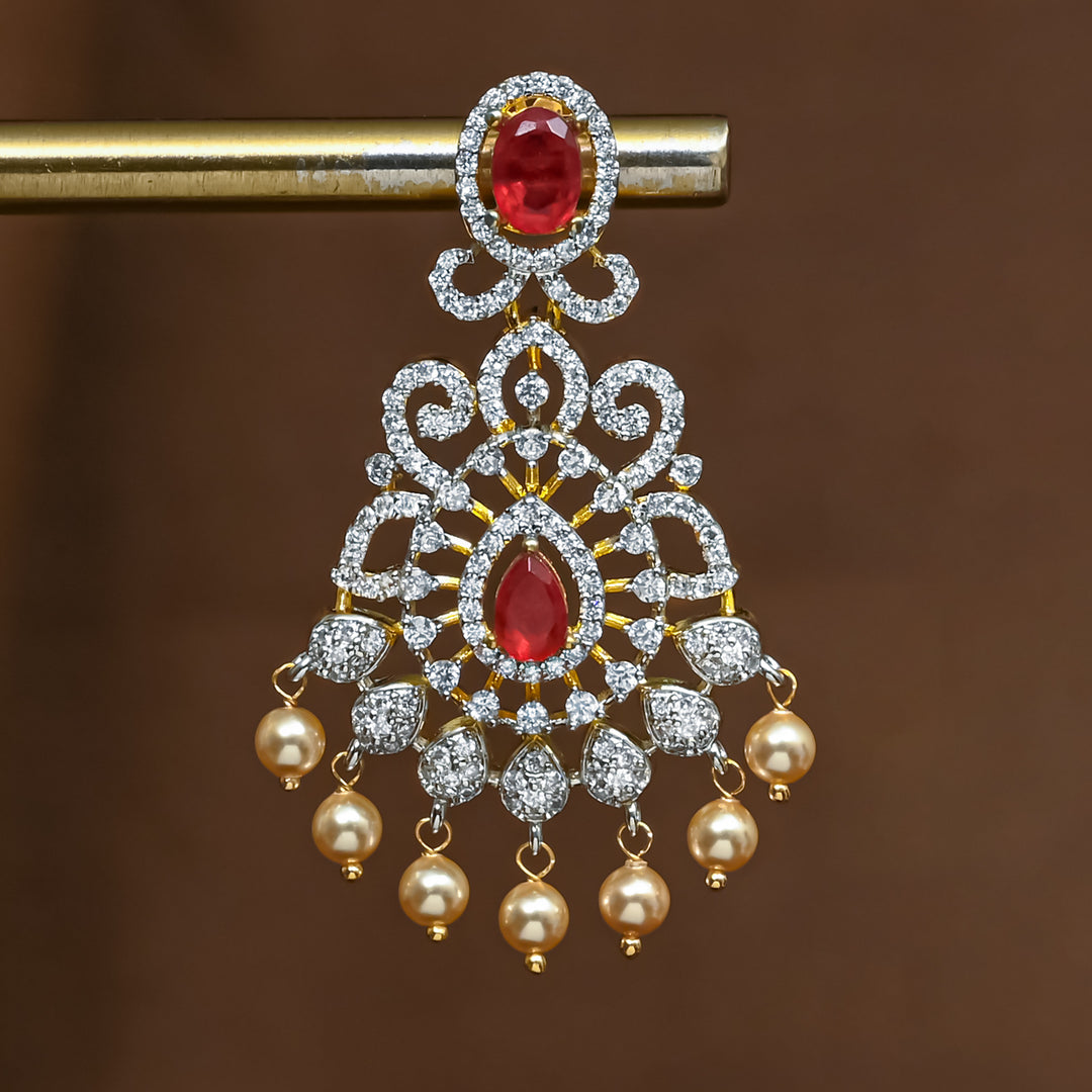 Close-up view of premium 92.5 silver cz ruby jhumka earrings with intricate detailing and pearl drops by Sri Fine Jewellery, Hyderabad (https://srifinejewellery.com)