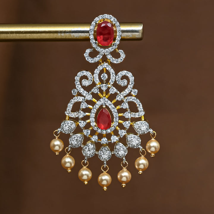 Close-up view of premium 92.5 silver cz ruby jhumka earrings with intricate detailing and pearl drops by Sri Fine Jewellery, Hyderabad (https://srifinejewellery.com)