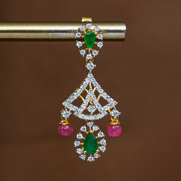 Close-up view of premium 92.5 silver cz emerald jhumka earrings with intricate detailing by Sri Fine Jewellery, Hyderabad (https://srifinejewellery.com)
