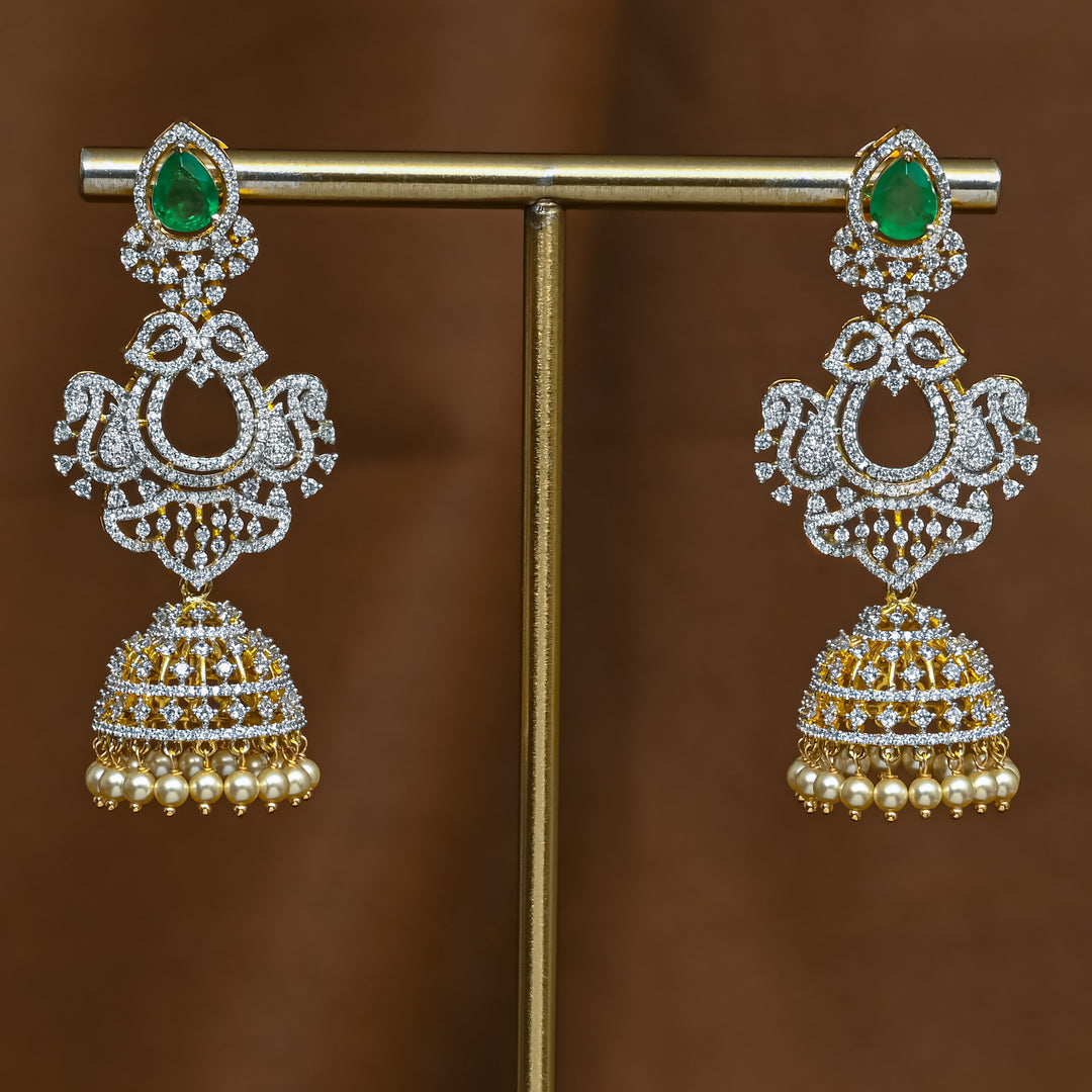 Full view of premium 92.5 silver cz emerald jhumka earrings with intricate detailing and pearl drops by Sri Fine Jewellery, Hyderabad (https://srifinejewellery.com)