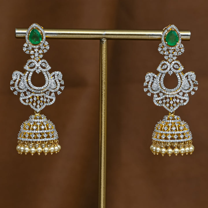 Full view of premium 92.5 silver cz emerald jhumka earrings with intricate detailing and pearl drops by Sri Fine Jewellery, Hyderabad (https://srifinejewellery.com)