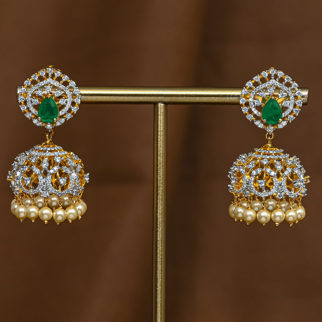 Full view of premium 92.5 silver cz emerald jhumka earrings with intricate detailing and pearl drops by Sri Fine Jewellery, Hyderabad (https://srifinejewellery.com)