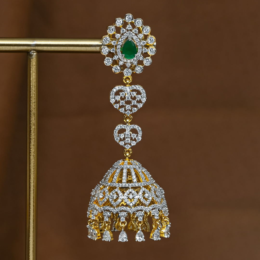 Close-up view of premium 92.5 silver cz emerald jhumka earrings with intricate detailing and cz drops by Sri Fine Jewellery, Hyderabad (https://srifinejewellery.com)