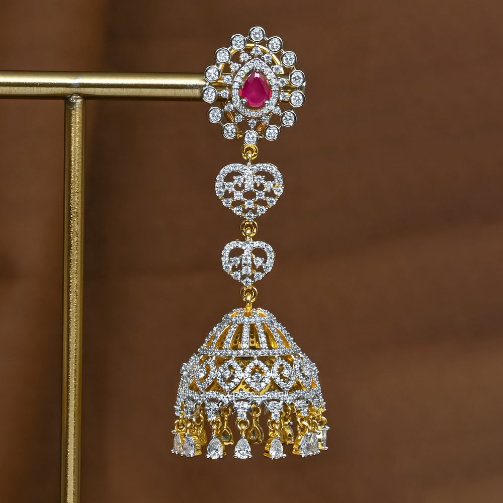 Close-up view of premium 92.5 silver cz emerald jhumka earrings with intricate detailing and cz drops by Sri Fine Jewellery, Hyderabad (https://srifinejewellery.com)