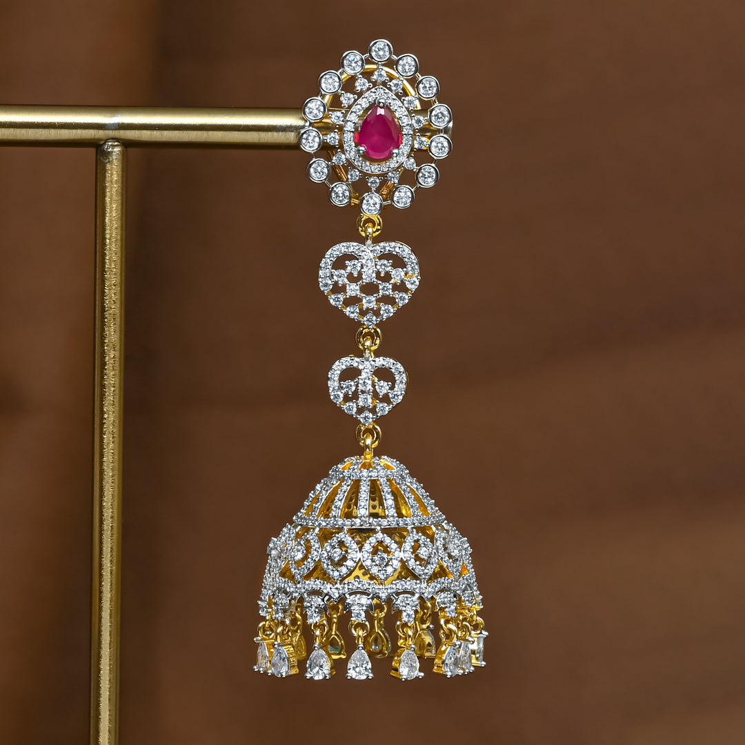 Close-up view of premium 92.5 silver cz emerald jhumka earrings with intricate detailing and cz drops by Sri Fine Jewellery, Hyderabad (https://srifinejewellery.com)