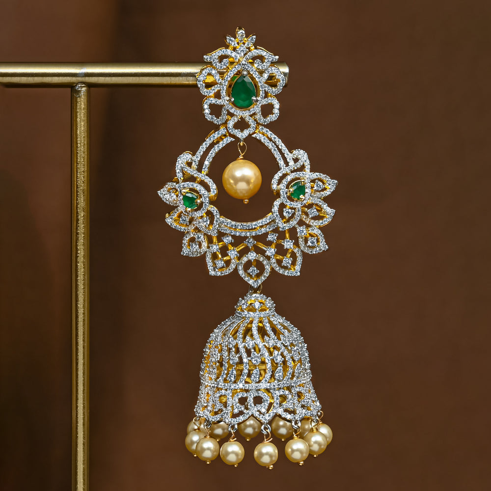 Close-up view of premium 92.5 silver cz emerald jhumka earrings with intricate detailing and pearl drops by Sri Fine Jewellery, Hyderabad (https://srifinejewellery.com)