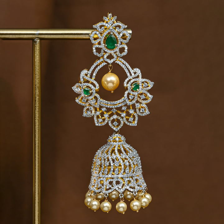 Close-up view of premium 92.5 silver cz emerald jhumka earrings with intricate detailing and pearl drops by Sri Fine Jewellery, Hyderabad (https://srifinejewellery.com)