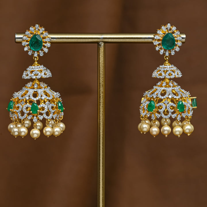 Full view of premium 92.5 silver cz emerald jhumka earrings with intricate detailing and pearl drops by Sri Fine Jewellery, Hyderabad (https://srifinejewellery.com)