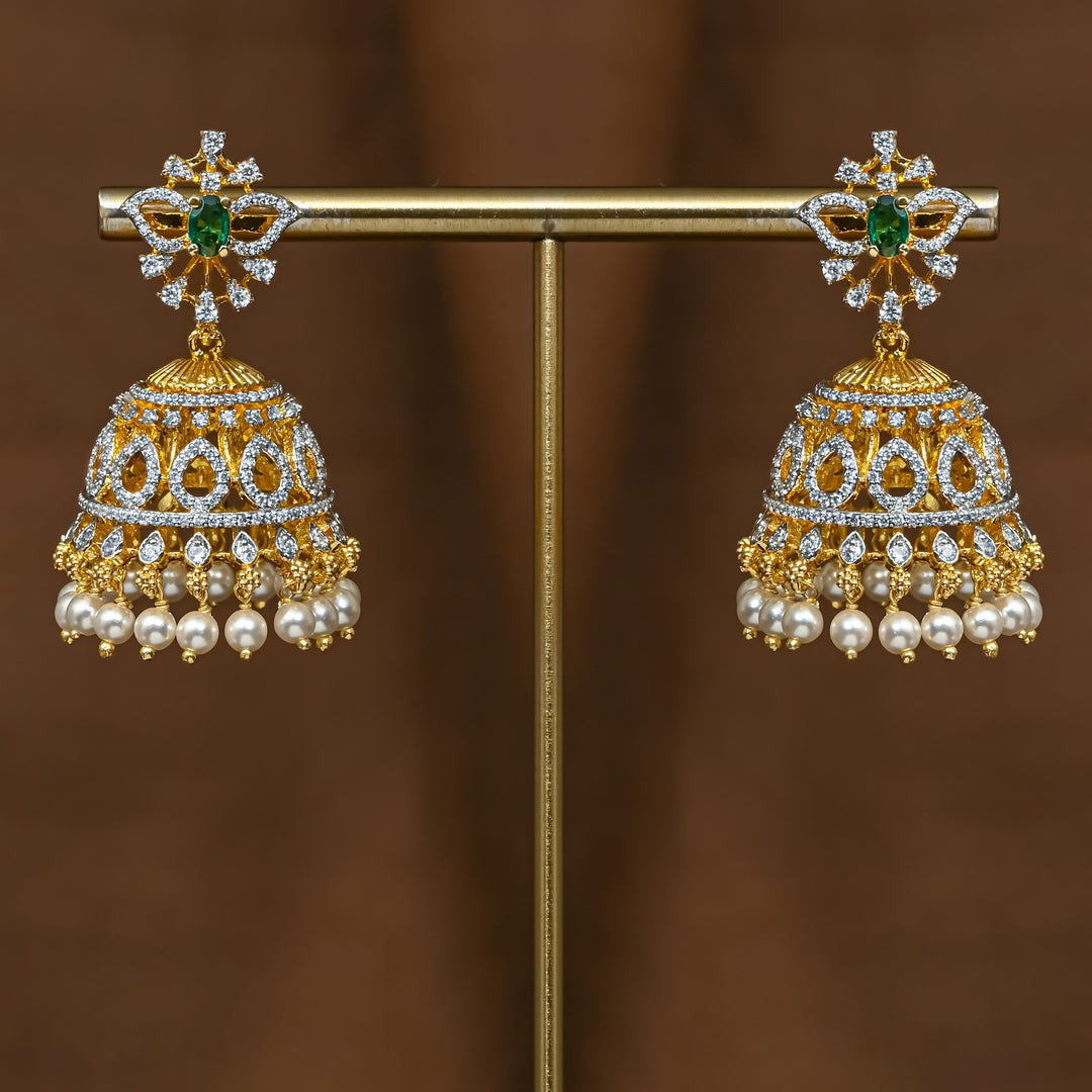 Full view of premium 92.5 silver cz emerald jhumka earrings with intricate detailing and pearl drops by Sri Fine Jewellery, Hyderabad (https://srifinejewellery.com)