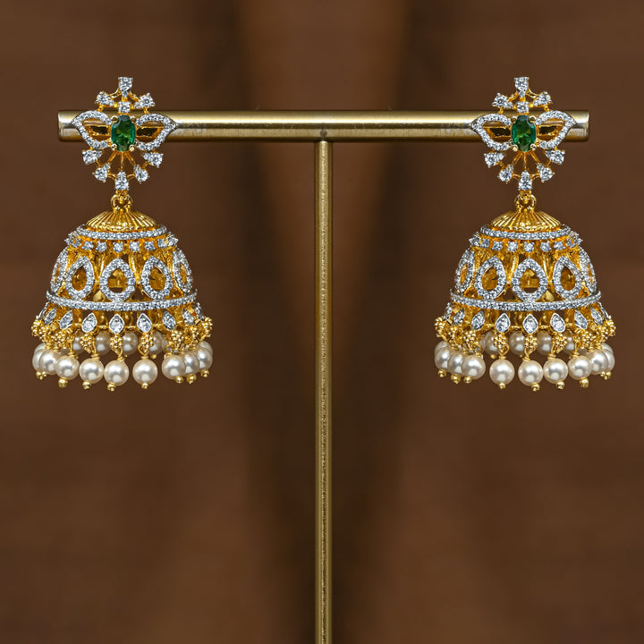 Full view of premium 92.5 silver cz emerald jhumka earrings with intricate detailing and pearl drops by Sri Fine Jewellery, Hyderabad (https://srifinejewellery.com)
