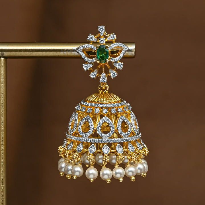 Close-up view of premium 92.5 silver cz emerald jhumka earrings with intricate detailing and pearl drops by Sri Fine Jewellery, Hyderabad (https://srifinejewellery.com)