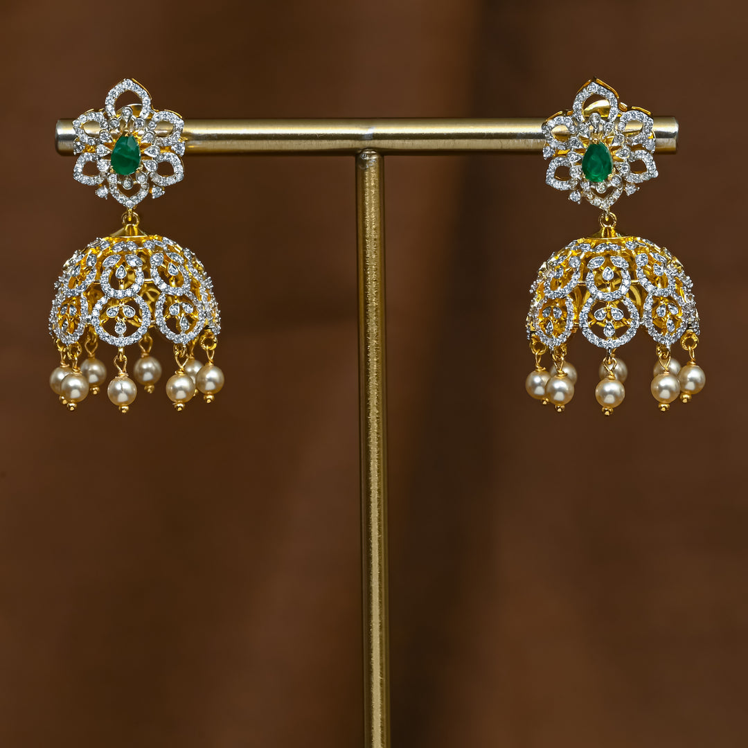 Full view of premium 92.5 silver cz emerald jhumka earrings with intricate detailing and pearl drops by Sri Fine Jewellery, Hyderabad (https://srifinejewellery.com)