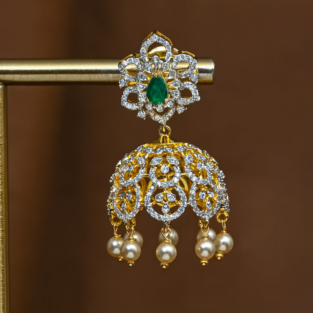 clos-up view of premium 92.5 silver cz emerald jhumka earrings with intricate detailing and pearl drops by Sri Fine Jewellery, Hyderabad (https://srifinejewellery.com)