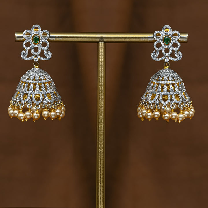 Full view of premium 92.5 silver cz emerald jhumka earrings with intricate detailing and pearl drops by Sri Fine Jewellery, Hyderabad (https://srifinejewellery.com)