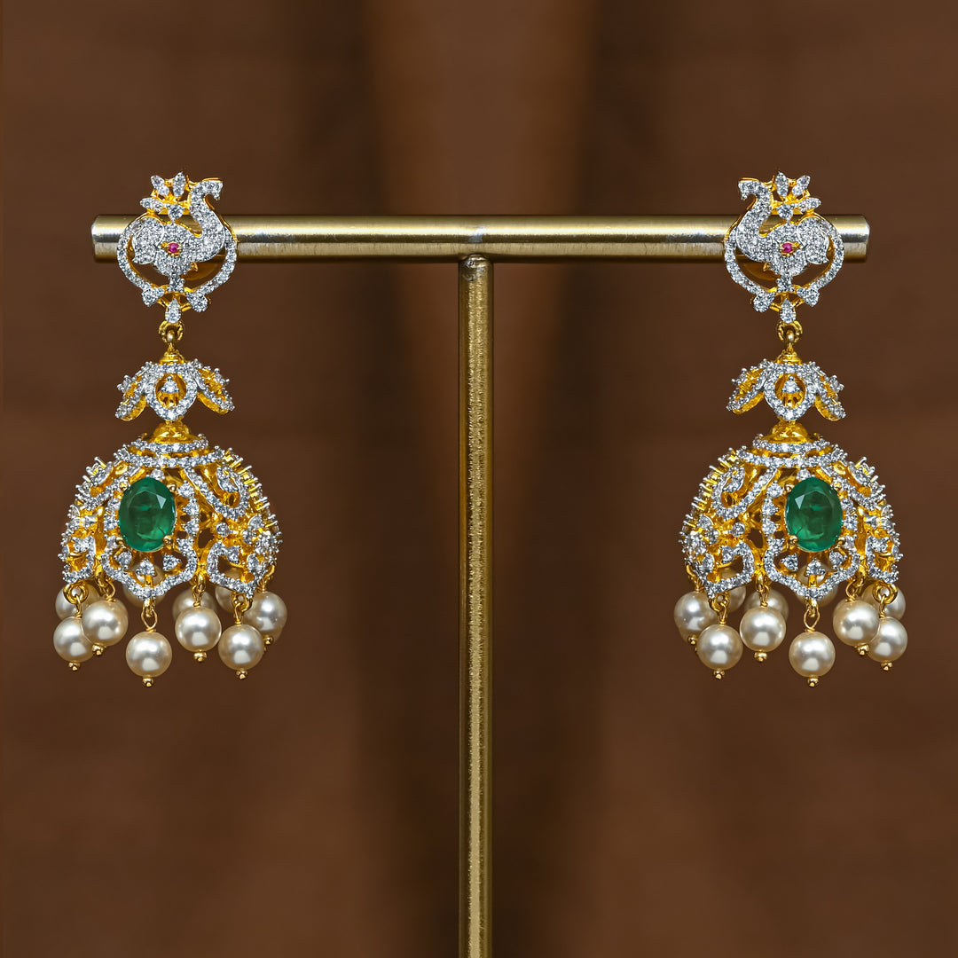 Full view of premium 92.5 silver cz emerald jhumka earrings with intricate detailing and pearl drops by Sri Fine Jewellery, Hyderabad (https://srifinejewellery.com)